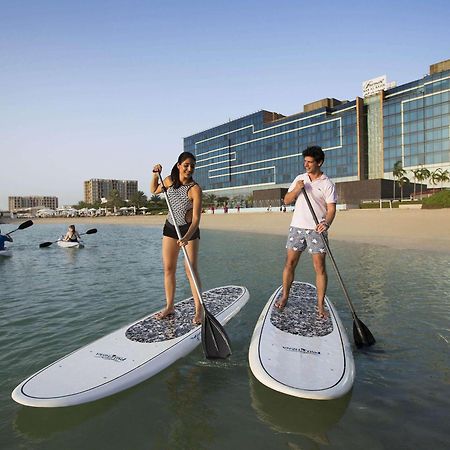 Fairmont Bab Al Bahr Hotell Abu Dhabi Eksteriør bilde Stand Up Paddle Boarding at Jumeirah Beach Hotel